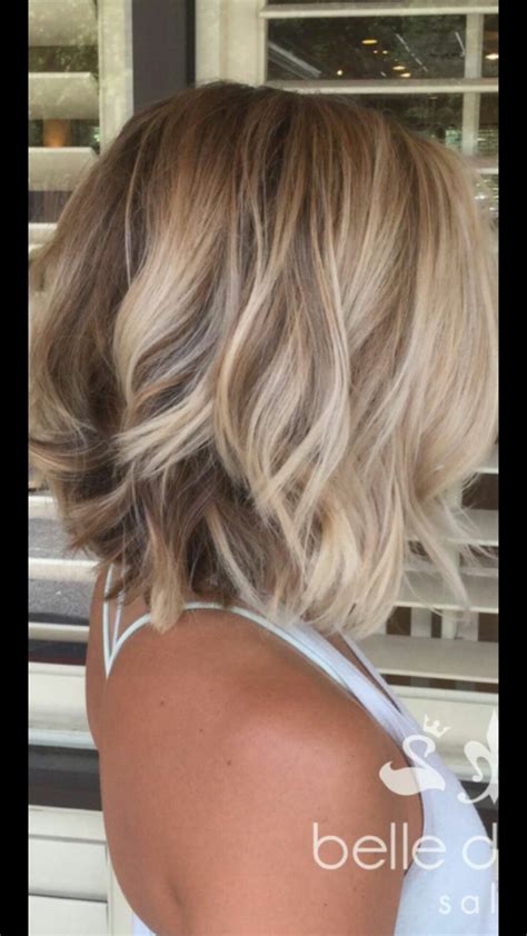 Adding some champagne blonde balayage color is a great way to hide your naturally gray hair and add a youthful look if you go short. Medium Length 2020 Hairstyles For Women Over 40 - FCC