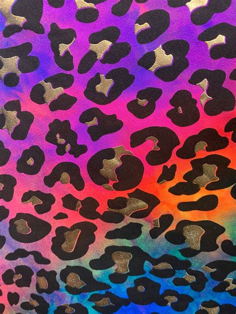 Cheetahleopard Print With Gold On Rainbow Tie Dye Nylon Spandex Four Way Stretch Fabric Sold By