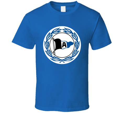 Arminia bielefeld's new 115th anniversary strip is being sold in a special box that includes a number of little extras, such as a scarf, a patch of the original club emblem and the. Arminia Bielefeld German Soccer Team T Shirt