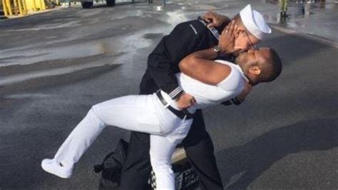 Image Of Sailor Kissing Same Sex Partner After Deployment Sparks
