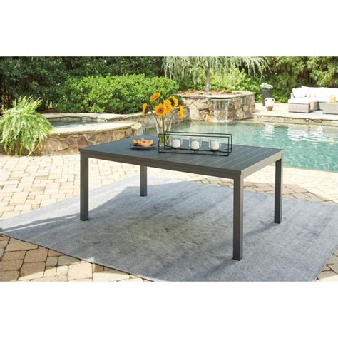 I am writing this complaint in regards to coffee tables purchased at ashley furniture. P315-625 Ashley Furniture Okada Patio Table