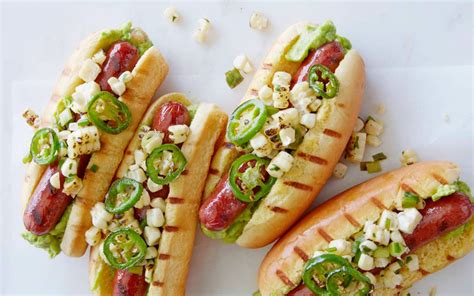 Add hot dogs and ham and cook, turning one time, until lightly charred and warmed through, about 4 minutes for the hot dogs and 1 minute for the ham. America's 16 Best Hot Dog Recipes