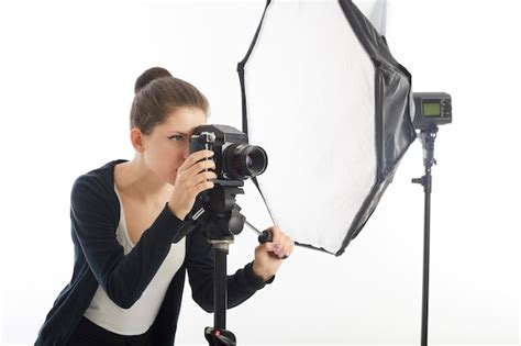Premium Photo Female Photographer Working In Studio