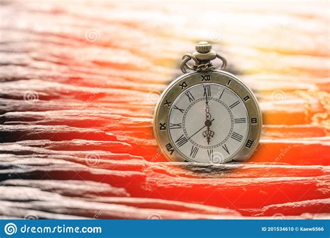 Vintage Old Pocket Clock Showing Time On The Wooden Stock Photo Image