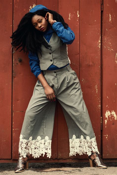 Free Photo Woman Wearing Gray Waist Vest And Gray Flare Pants