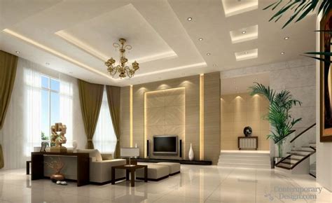 The basic false ceiling is given a luxurious feel with the addition of a beautifully carved wooden sheet, along the four sides of the roof. Latest false ceiling designs for living room ...