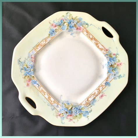 Lanternier used scrolling floral patterns on a white background along with gold or silver trim on the you can find examples of haviland patterns in collectors books available through dealers and. Delinieres & Co Limoges France Two-Handled Handpainted ...