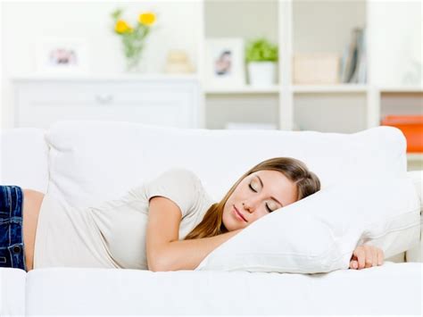 Free Photo Beautiful Young Woman Sleeps On A Bed In A Bedroom At Home