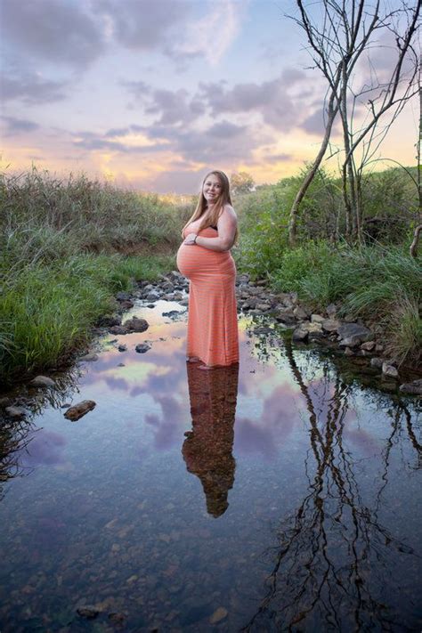 Maternity Portrait In Small Creek Or Stream Of Water Maternity