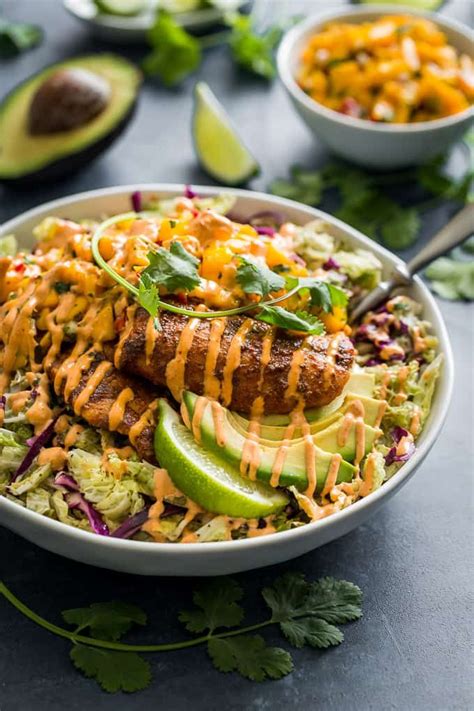 Place egg yolk, lemon juice, garlic, and anchovy in a blender and blend on low speed until smooth, about 1 minute. Fish Taco Slaw Bowls with Mango Salsa and Chipotle Aioli ...
