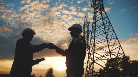 Teamwork Two Electricians Engineer Shake Hands Business Partnership