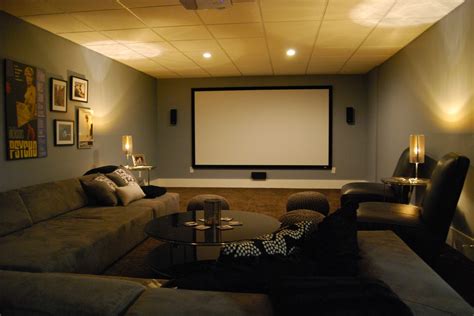 Basement Media Room With Sectional Sofa And Giraffe Texture Carpeting