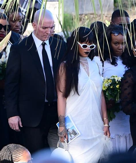 Rihanna Wipes Away Tears At Murdered Cousins Funeral In Barbados As She Lays Wreath On His