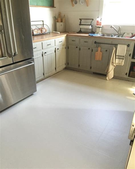 Kneel on a towel to prevent the first coat from pulling up, plus it'll be softer on your legs. Painted Linoleum Floors! | Farmhouse Kitchen Remodel ...