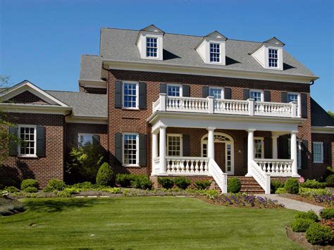 They add aesthetic value as well as functional value. Brick House Architecture With White Pillars For Front ...