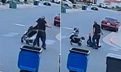 Moment Stranger Walks Up To Man Pushing A Stroller And Punches Him
