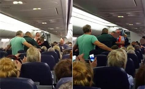 People Cheer As Drunk Passenger Is Escorted Off Plane After Forcing