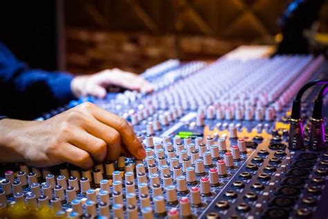 Producer Sound Engineer Hands Working On Audio Mixing Console In