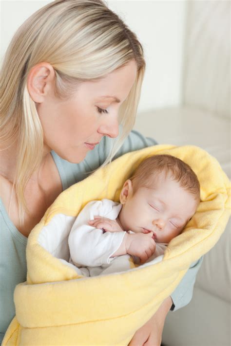 Young Mother Holding Her Sleeping Baby Stock Photo 01 Free Download