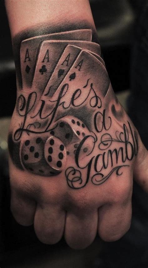 A Man S Hand With A Tattoo On It That Says Life Is A Game