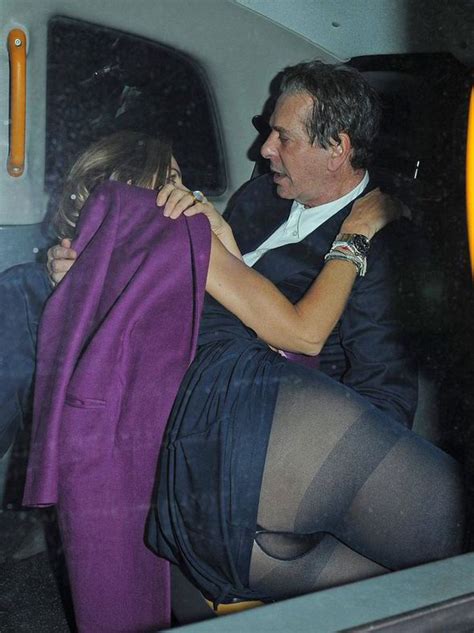 Bottoms Up Trinny Woodall Flashes Her Knickers As She Cuddles Up To
