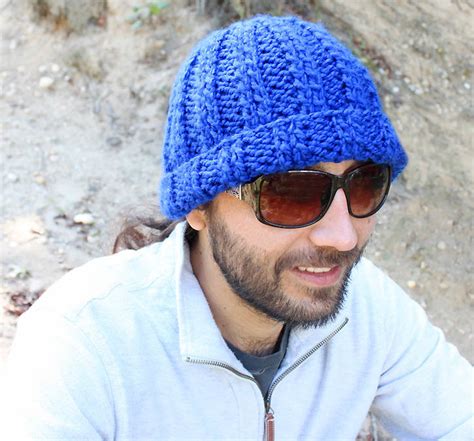 Knit hats for men with our hat patterns. True Blue Men's Beanie | AllFreeKnitting.com