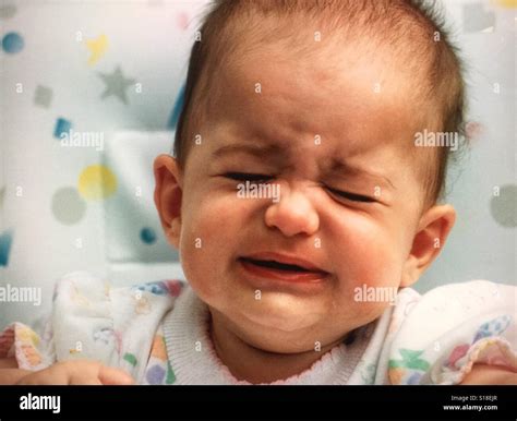 A Baby Girl Crying Angrily Stock Photo Alamy