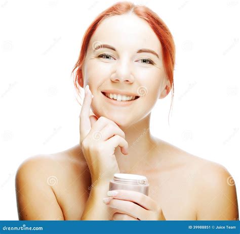 smiling woman applying cream on her face stock image image of model healthcare 39988851