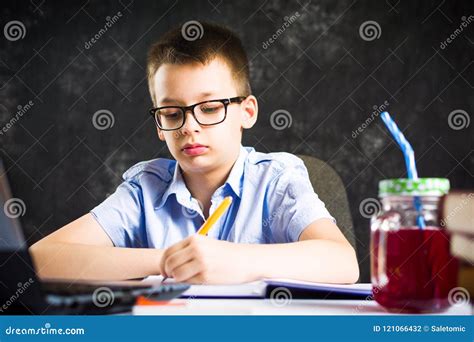 Schoolboy Finishing Homework At Home Stock Photo Image Of Child