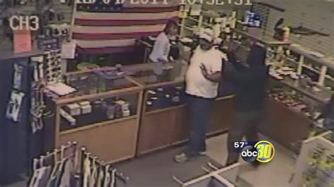 surveillance video shows frightening armed gun store robbery abc30 fresno