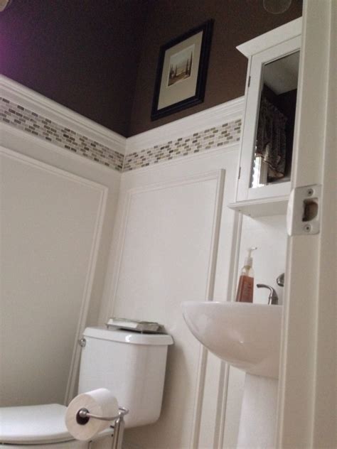 Bathroom wainscoting with tile border. Powder Room Update; shadow box wainscoting and tile border ...