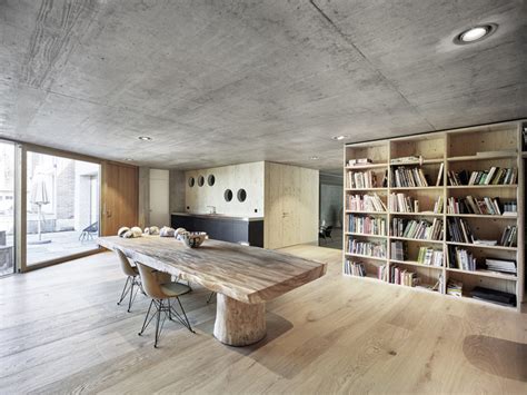 Raw Interiors 20 Projects That Use Exposed Wood And Concrete Archdaily
