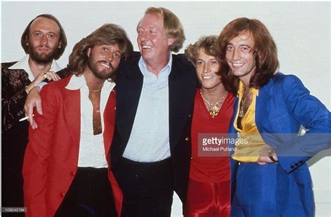 The Bee Gees With Brother Andy Gibb And Manager Robert Stigwood New