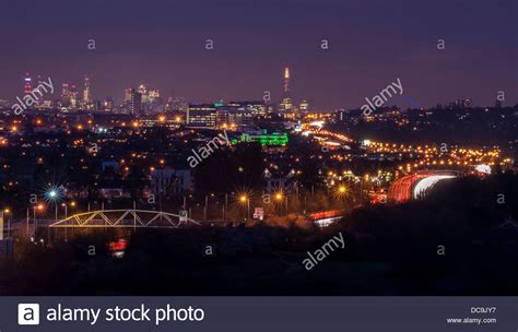 Looking West At The London Skyline At Night With A40 Commuter Road Busy