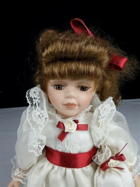 Dandee Collectors Choice Porcelain Doll 12 Brown Curly Hair Brown