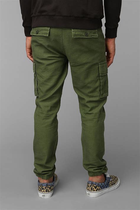 From spanish cargo (load, burden), from cargar (to load), from late latin carricare. Urban Outfitters Koto Cinched Cargo Pants in Olive (Green ...