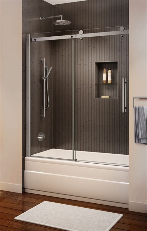 Sliding panels are often better suited to bathtub/shower combinations than hinged. Novara Frameless Sliding Tub Enclosure | ArtistCraft.com