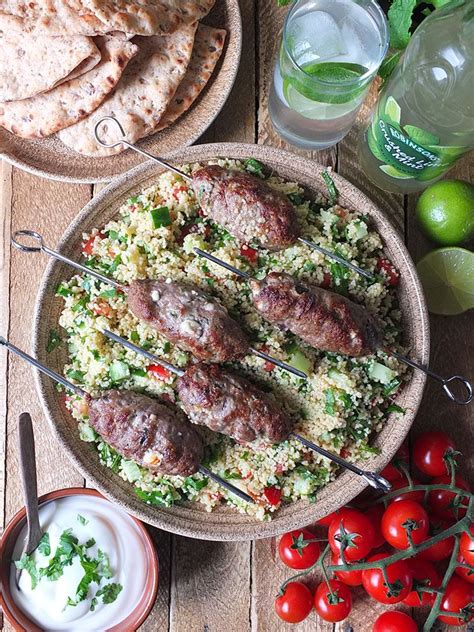 Grilled lamb skewers with couscous tabbouleh. Grilled Lamb Skewers with Feta & Mint Inspired by ...