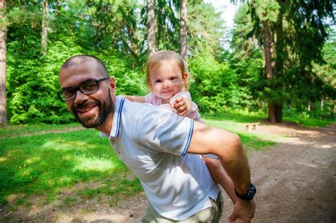 Father Playing With His Baby Daughter In The Nature Stock Image Image