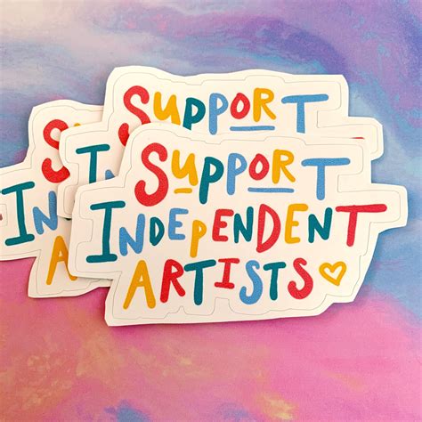 Two Stickers With The Words Support In Independent Artists Written On