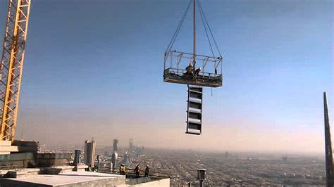 There are great bite size videos explaining the key points. Tadawul tower last panel installation - YouTube