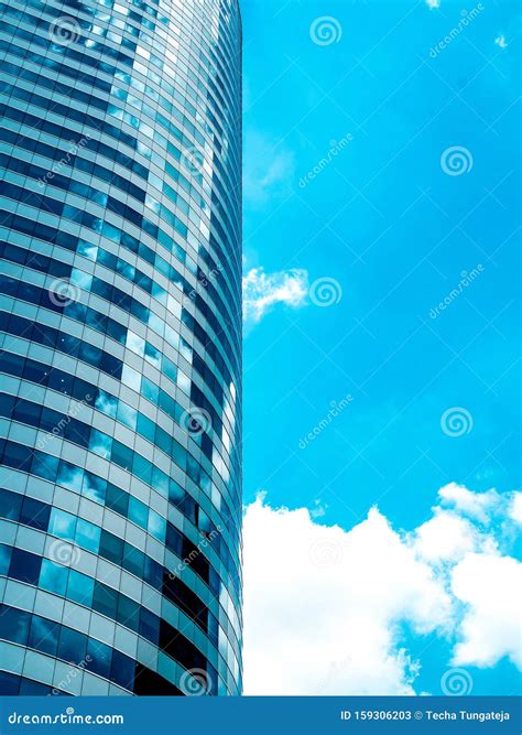 Modern Building Skyscrapers Reflection Blue Sky And Clouds Abstract