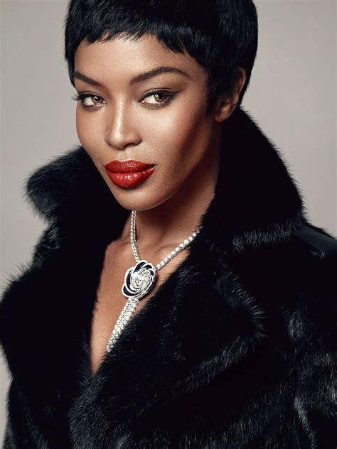 She has chestnut hair and brown eyes, but she wears colored contact lenses, blue and green. NAOMI CAMPBELL in Madame Figaro, December 2014 Issue ...