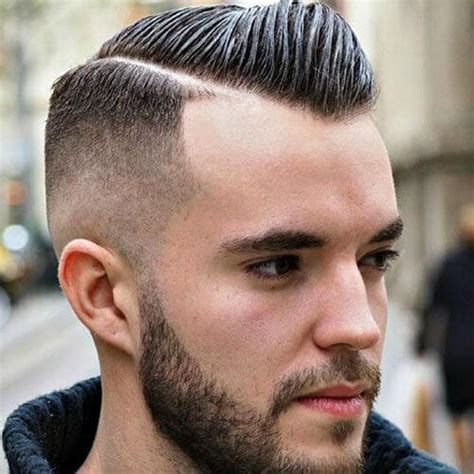 A structured silhouette to the top hair makes this skin fade hairstyle for short hair look majestic, especially with the beard being balanced well by the style. 45 Bald Fade with Beard Ideas to Kickstart Your Style ...