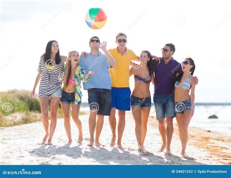 Group Of Friends Having Fun On The Beach Stock Photo Image Of