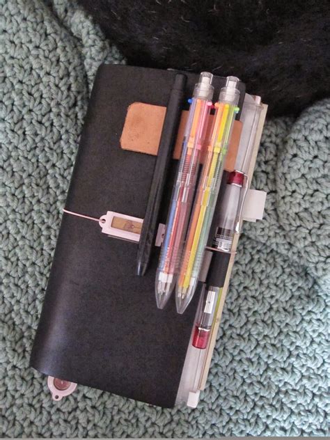 Yep, a pen storage system, or i guess you could say a pen holder. Diy Notebook Pen Holder. Journal Pen Holder - Made To Be A Momma