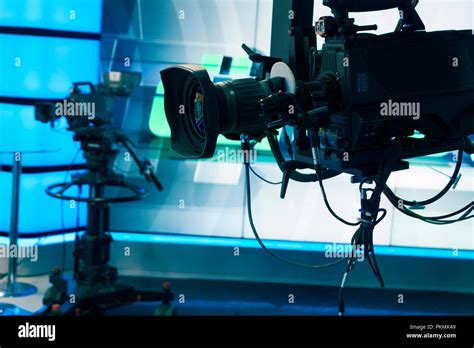 Broadcast Television Studio Camera And Crane Camera In News Studio Room