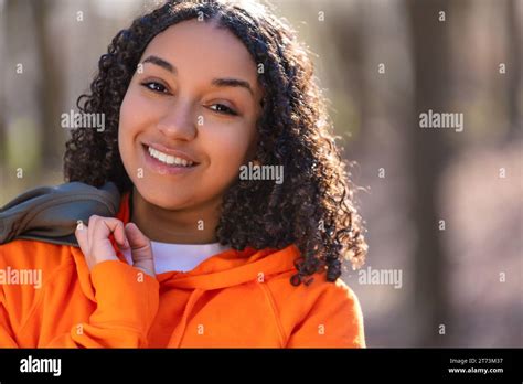 Outdoor Portrait Of Beautiful Happy Mixed Race Biracial African American Girl Teenager Female