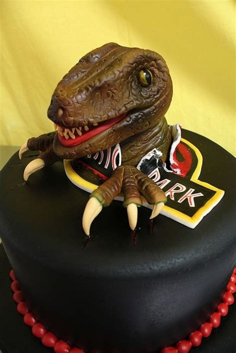 The icing is chocolate buttercream. Jurassic Park Cake Ideas / jurassic park Cakes
