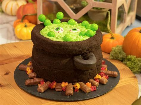 The folks of the kitchen host a cakewalk with spooky pumpkin patch cake as the prize and make delicious food party crafts; Cauldron Cake Recipe | Food Network